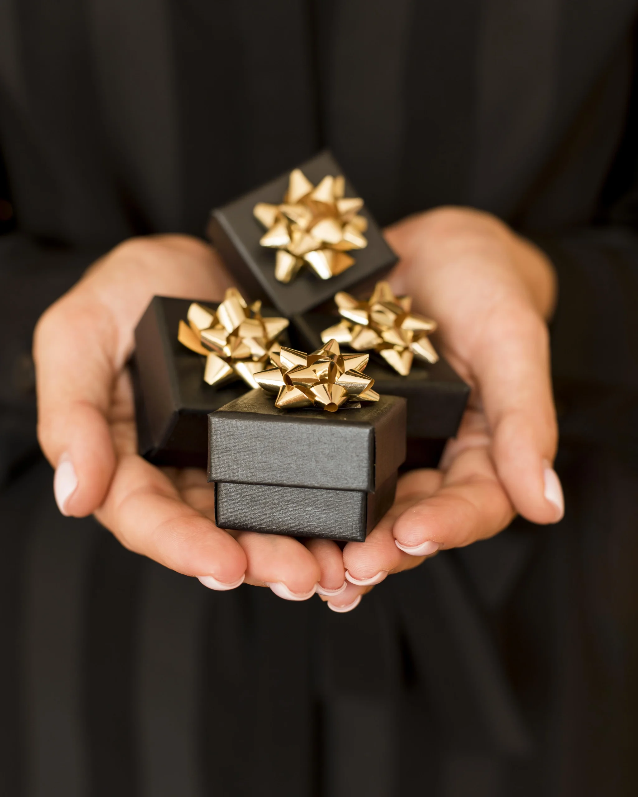 Home gift boxes with golden ribbon black friday front view copy